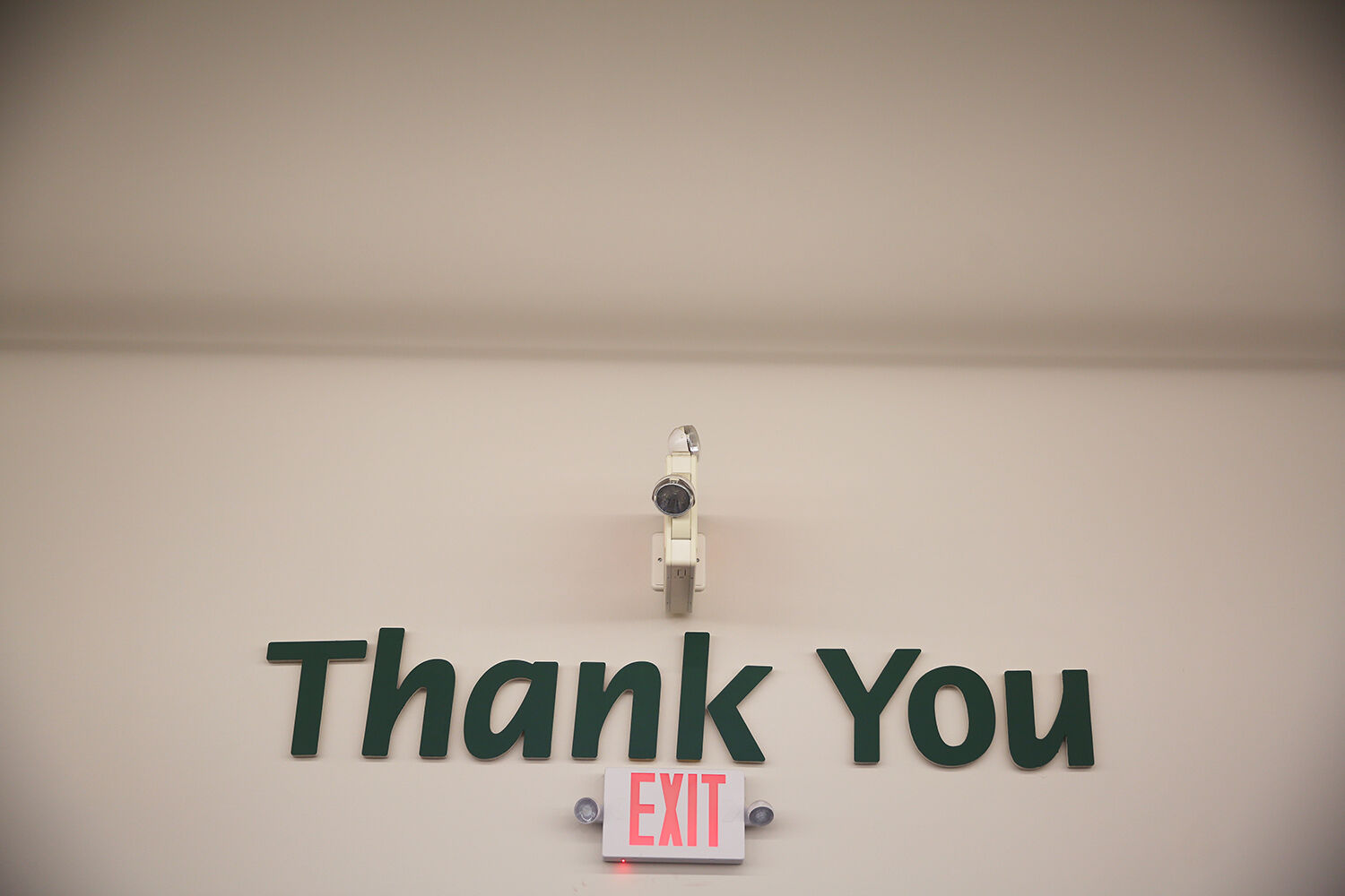 The large “Thank You” and “Restrooms” signs
